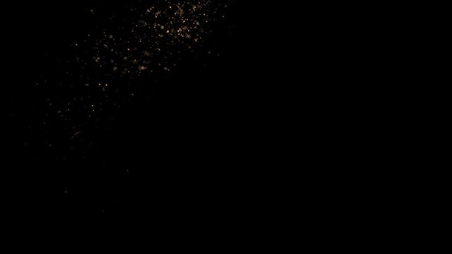 Beautiful blue glitter and sparkles, particles snow burst black background. Magic sparkles fairy dust wand particle trail transition sparkle stars glitters infinity light trail golden light effects