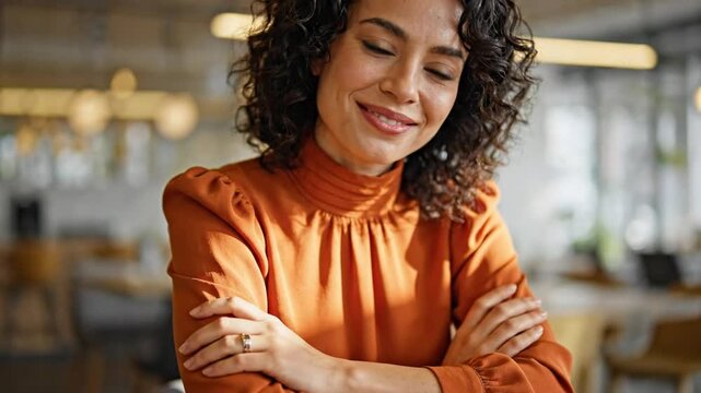 Confident Woman Embracing Inner Peace and Success in Modern Workspace