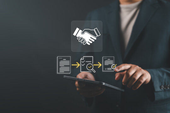 Procurement process management concept with digital and paper document approval, contract verification, supplier negotiation, and purchasing operations using laptop in office environment.