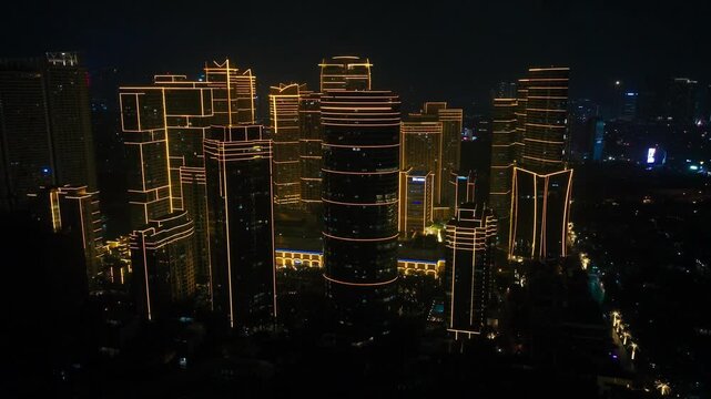 City skyline at night with illuminated skyscrapers in Makati Metro Manila