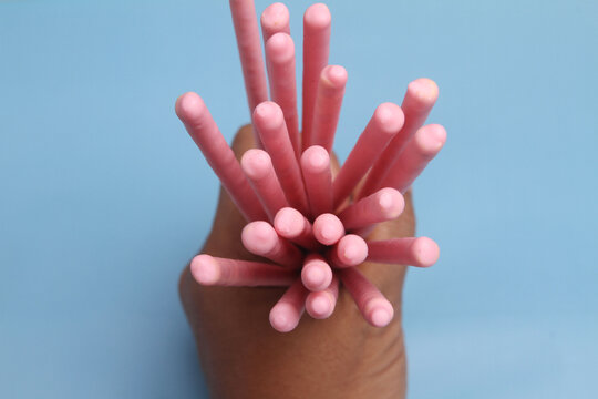 close up creamy biscuits stick with blue background