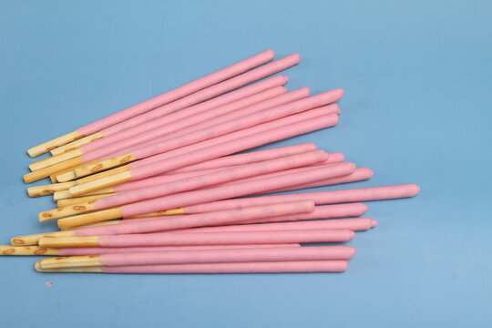 biscuits stick on blue background
