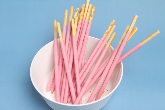 biscuits stick on white bowl