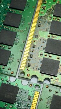 Electronic printed circuit boards with memory chips close-up. Vertical video