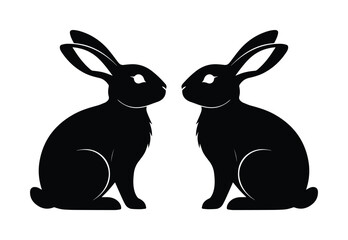 Obraz premium Black rabbit silhouette vector, mirror image of two sitting bunnies, minimalist animal profile icons for Easter and nature branding