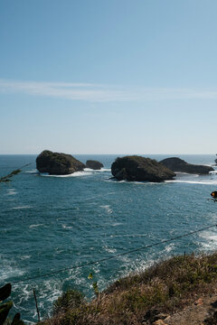 Rocky Islands Dotting the Deep Blue Ocean Near Kasap Beach, Pacitan