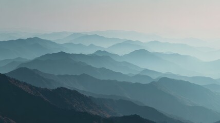 Obraz premium Layered mountain ridges with atmospheric 