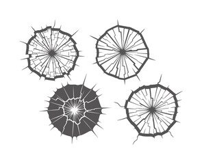 Obraz premium Four dark grey circular shattered glass effects white broken crack impact