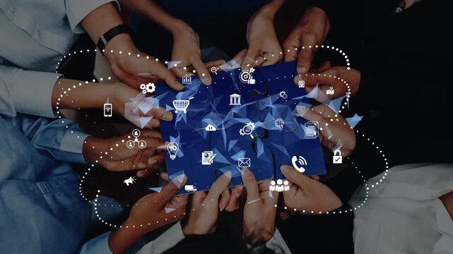 A diverse group of hands gathers around a digital interface adorned with various business and technology icons, symbolizing collaboration and innovation in a modern workspace. Raster