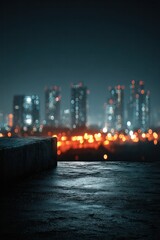 Fototapeta premium City skyline at night with bokeh lights and waterfront