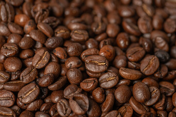 Fototapeta premium Close-up of freshly roasted coffee beans background