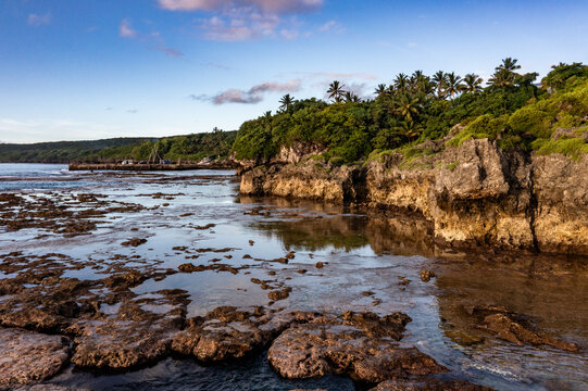 Aerial View of Tropical Coastline with Cliffs and Reef in Niue
