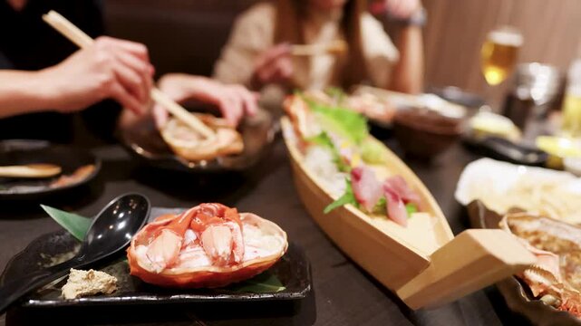 Japanese Seafood Dinner with Crab Legs and Sushi Boat in Tokyo