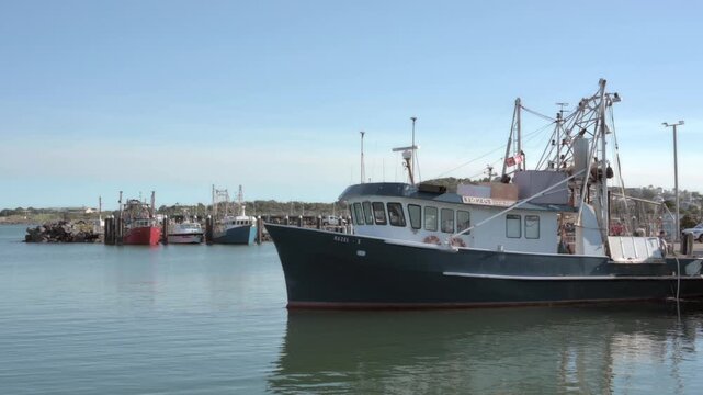 Fishing boats mooring in Coffs Harbour NSW Australia.Australia exported fisheries and aquaculture products valued at approximately US$912.14 million, with a 4% increase in value compared to 2020, focu
