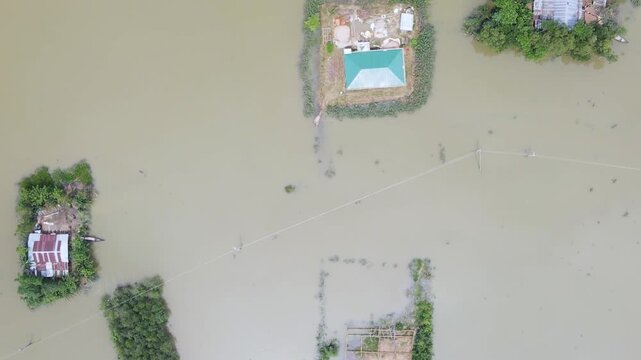 Drone shot of sylhet haor submerged village in flood water, Bangladesh. Aerial view.