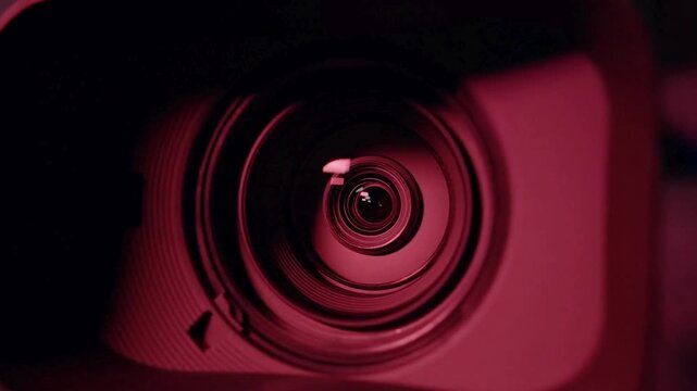 Professional Camera Lens Zooming In And Out To Focus A Sharp Image And To Capture Photograph Or Video. Camera lens Zooming, close-up to the Lens.
