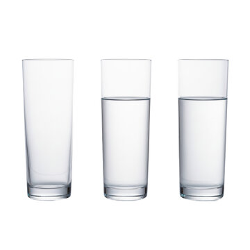 Three pristine glasses (empty, half-full, full of water) on a reflective white surface against a transparent background, strong backlighting. Concept of optimism and pessimism