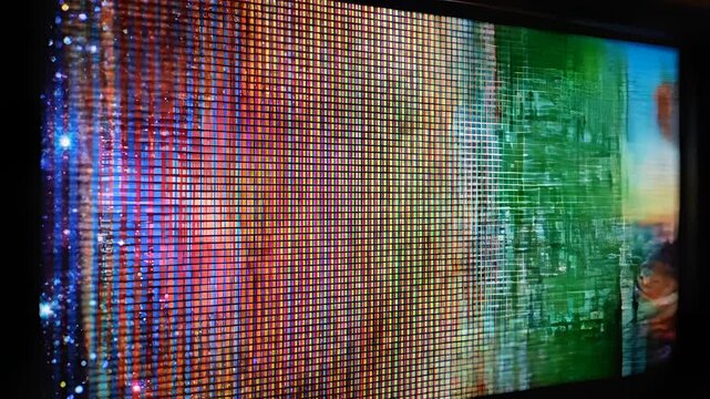 Closeup of a digital screen displaying a montage of diverse images.