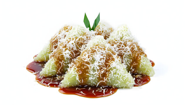 Sweet Indonesian Lupis, triangular sticky rice cakes coated in grated coconut and drizzled with thick palm sugar syrup
