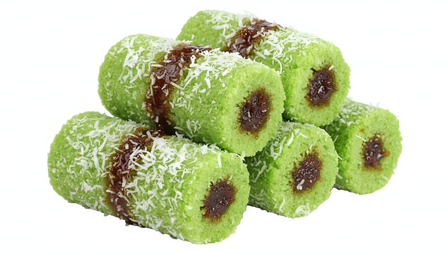 Authentic Indonesian Kue Putu, green cylindrical steamed rice cakes filled with melted palm sugar and topped with grated coconut