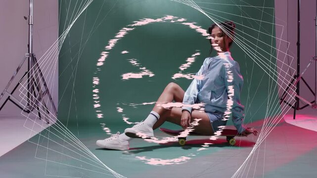 Playback starting, model on skateboard in set posing as pink glitch ring and wire covering fashion