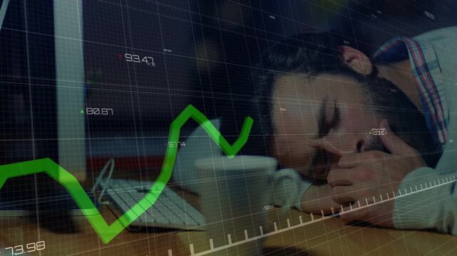 Office worker after tracking fluctuating finance chart, lowering head and resting on desk by mug