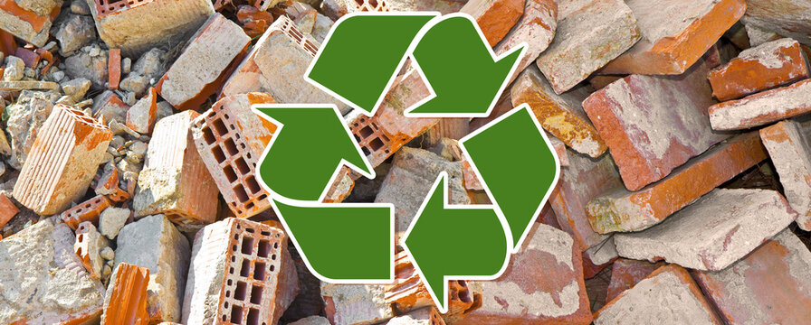Recovery and recycling of concrete and brick rubble debris on construction site after a demolition of a brick building