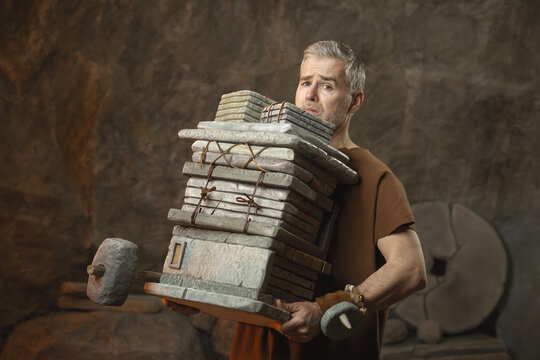 Overworked Prehistoric Employee Carrying Huge Stack of Stone Documents
