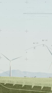 Vertical video: Overlay arising bars rising graphs tracing sky turbines turning showing energy data