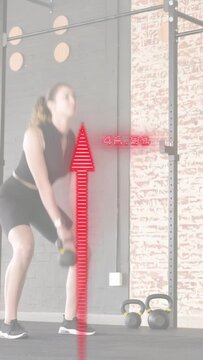 Vertical video: Woman hinging driving kettlebell swings, red arrows tracking numbers for fitness