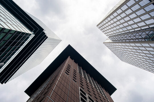 Frankfurt Bankenviertel modern office skyscraper seen in architectural perspective where corporate business finance defines an urban district of headquarters