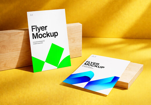 Two A4 Flyer Mockups on Wooden Blocks with Yellow Background and Sunlight Shadows