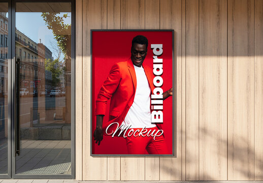 Vertical Billboard Mockup on Wooden Wall Exterior with Fashion Man in Red Suit Design