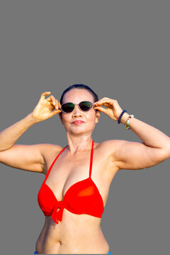 Woman beautiful busty in bikini relax