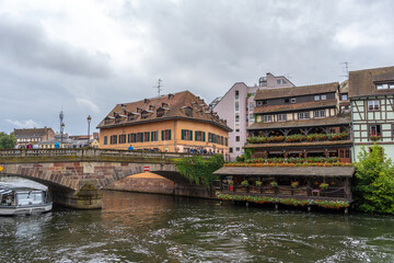 Naklejka premium Traditional restaurant on the riverside in Petite France, Strasbourg