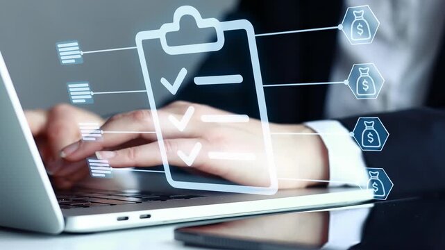 Business person using laptop to manage tasks and check off items on a list in office setting during work hours.