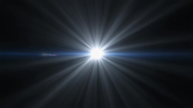 Bright light bursts against dark backdrop. Radiant beams extend outward from central source. Blue glow accents the glow's edge. Spectacular effect for digital compositing. Ideal for sci-fi, cinematic