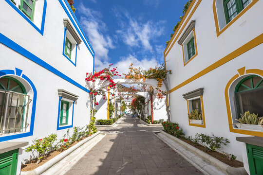 Puerto de Mogan typical colorful houses with flowers on Gran Canaria island holiday in Spain