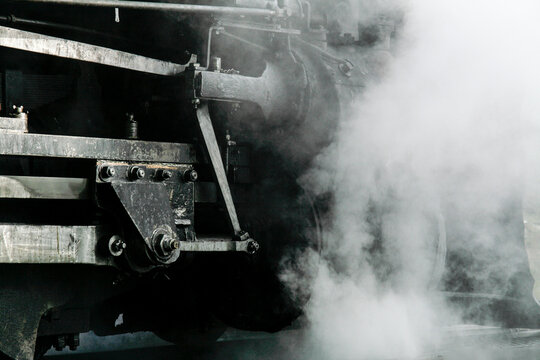 Steam rising from vintage locomotive detail