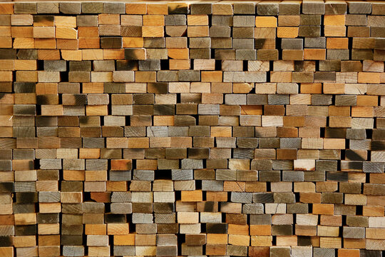 Stacked cut wood planks background