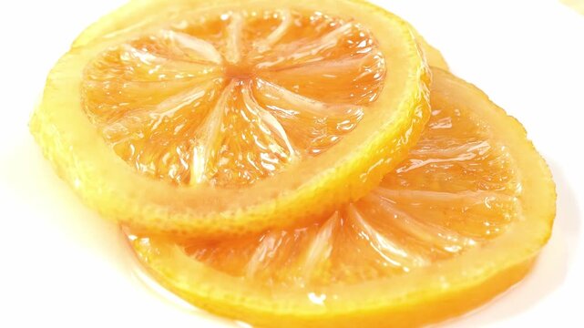 Sliced ​​lemons pickled in honey.