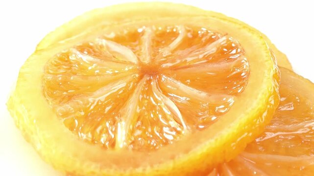Sliced ​​lemons pickled in honey.