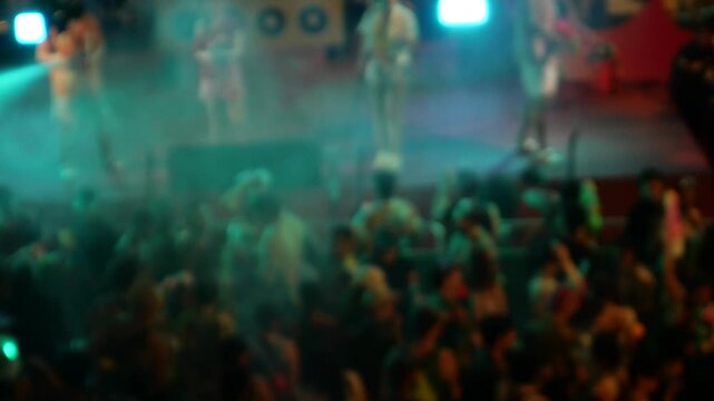 
Crowds enjoying Electronic Dance Music during Songkran Festival. Locals and tourists play with water and use water guns to celebrate the Songkran Festival in Bangkok. 