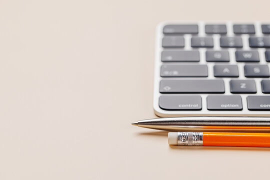 Office supplies on beige desk