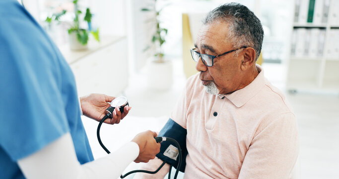 Senior, man and nurse with blood pressure machine in hospital with arm pump for exam. Elderly, male person or caregiver monitoring health on screening for hypertension, medical checkup or assessment