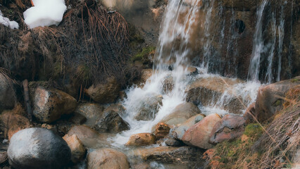 Mountain stream waterfall in the detail 