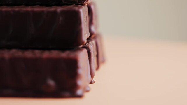 Delicious chocolate bars on a rotating surface. Protein bars close up. Snack before or after workout. High quality 4k footage