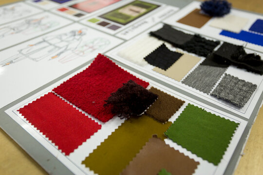 Fashion design board with fabric swatches and materials