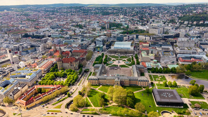Obraz premium A panoramic aerial view above the old town and downtown in the Stuttgart the capitol city of Baden-Württemberg in Germany on a sunny spring day