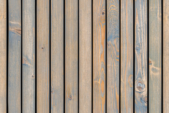 Wainscoting seamless texture made of thin gray-toned pine timber planks provides textured backdrop for design extreme close view